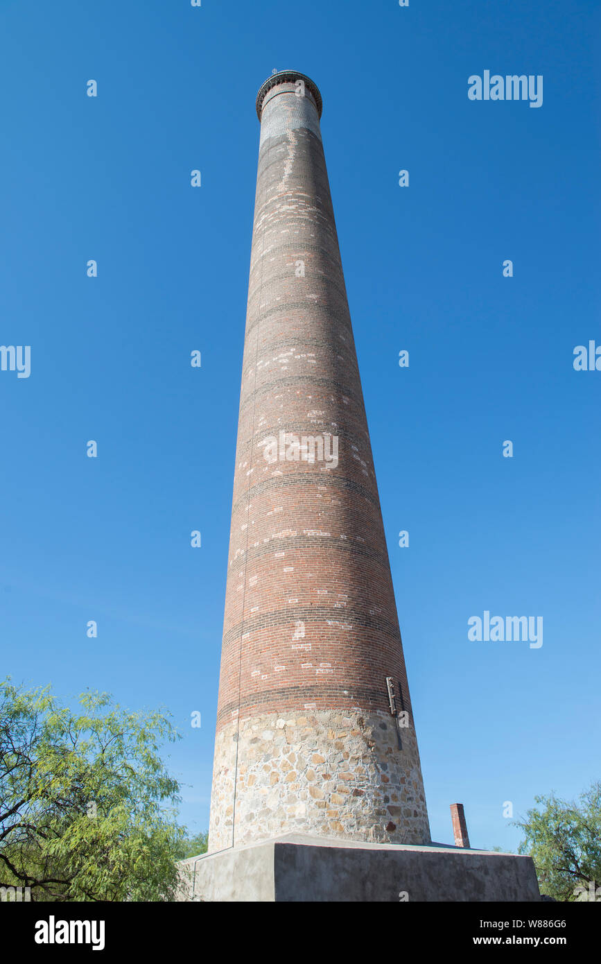 Famous brick chimney located in the mining town of EL TRIUNFO, in the Baja California Sur state. Mexico. Gold and silver old mining village Stock Photo