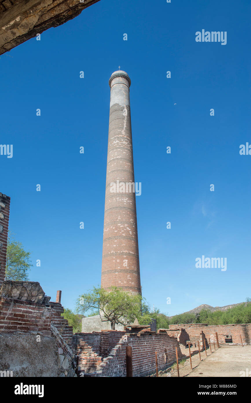 Famous brick chimney located in the mining town of EL TRIUNFO, in the Baja California Sur state. Mexico. Gold and silver old mining village Stock Photo