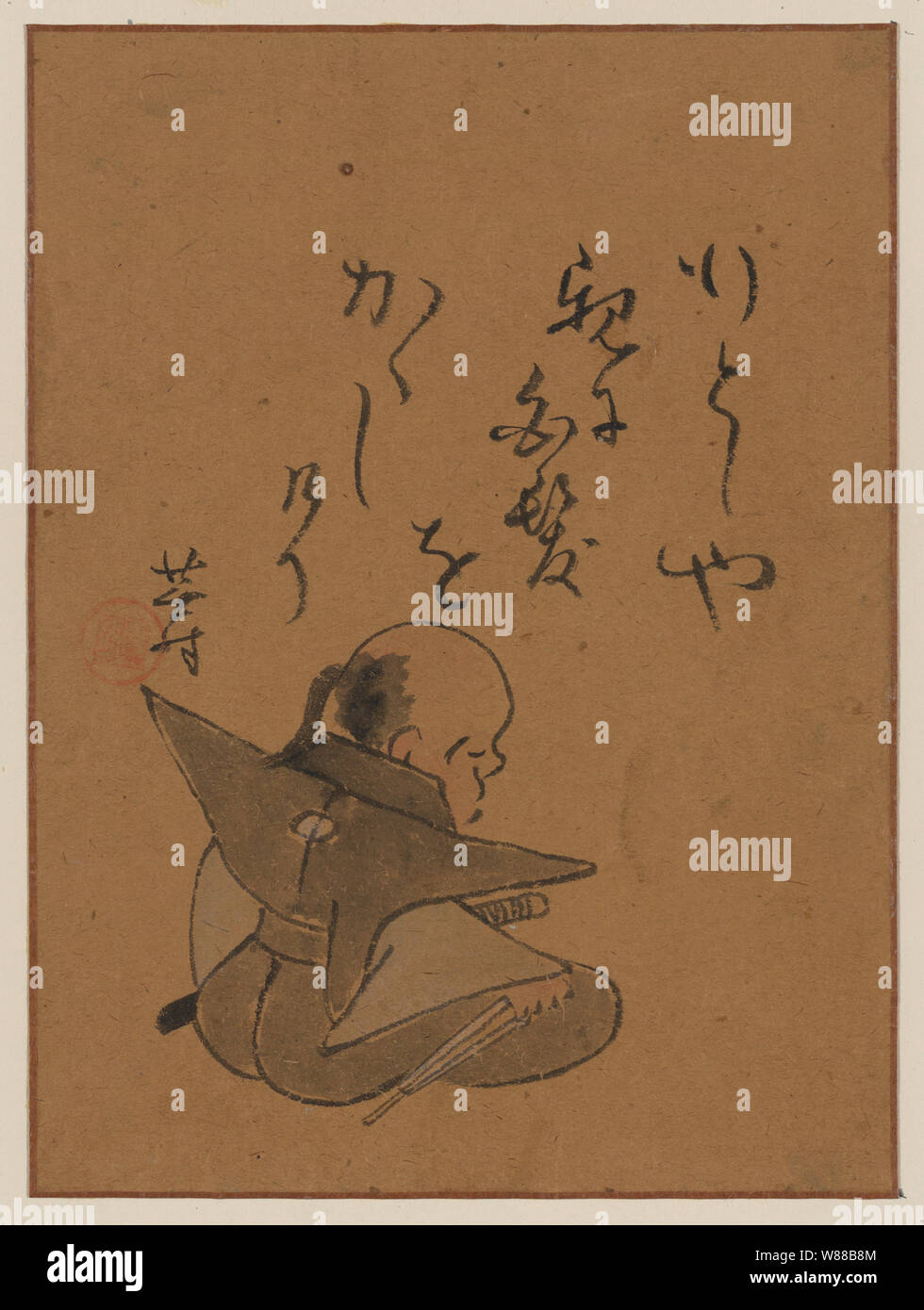 A man or monk seated, seen from behind, holding a short dagger() in right hand, while meditating or contemplating seppuku Stock Photo