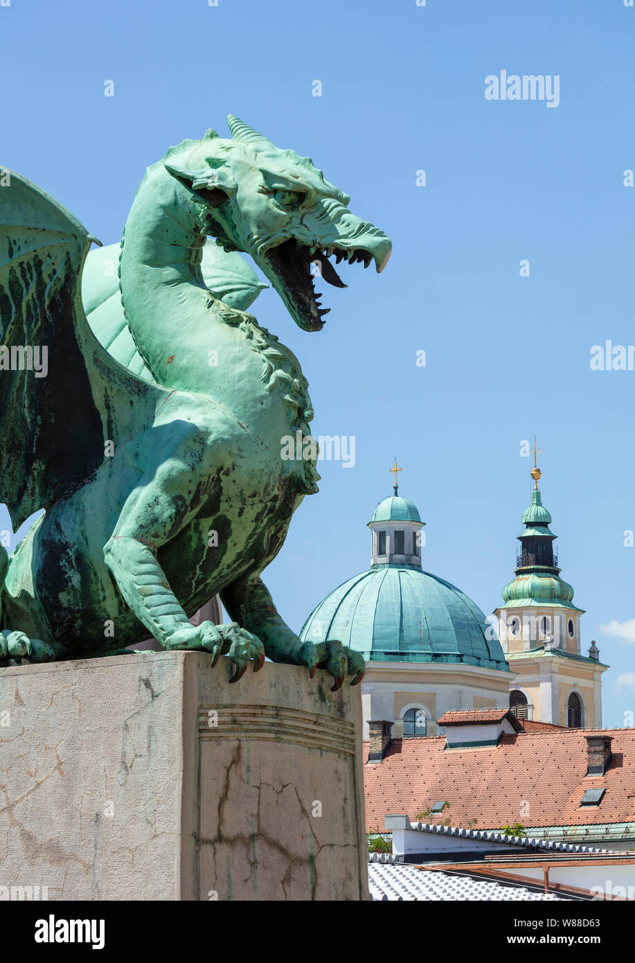 Dragon Bridge dragon statue on the Dragon bridge Zmajski most in front of the Ljubljana Cathedral Ljubljana Slovenia Eu Europe Stock Photo