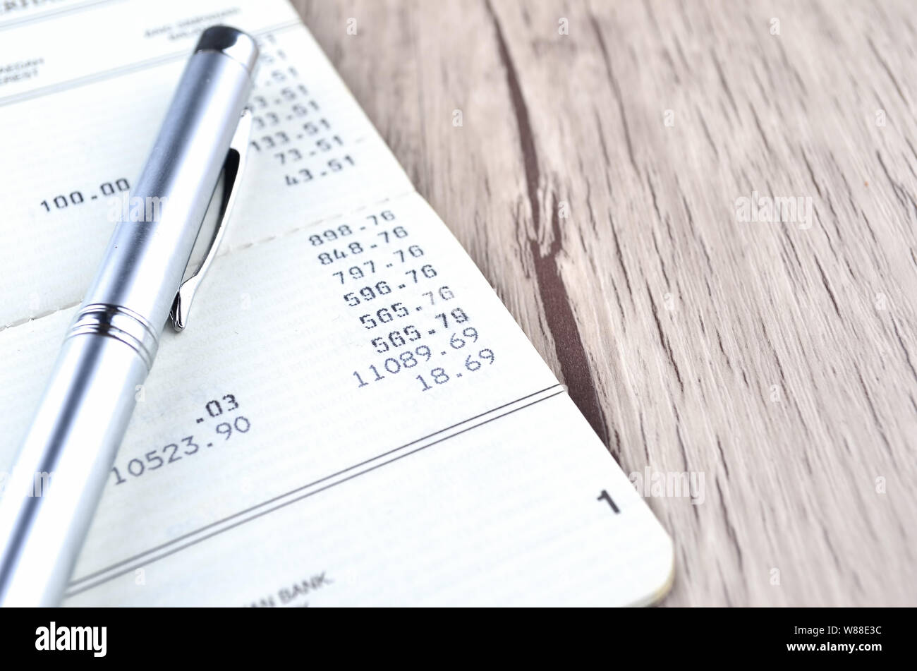 pen on bank account book Stock Photo Alamy