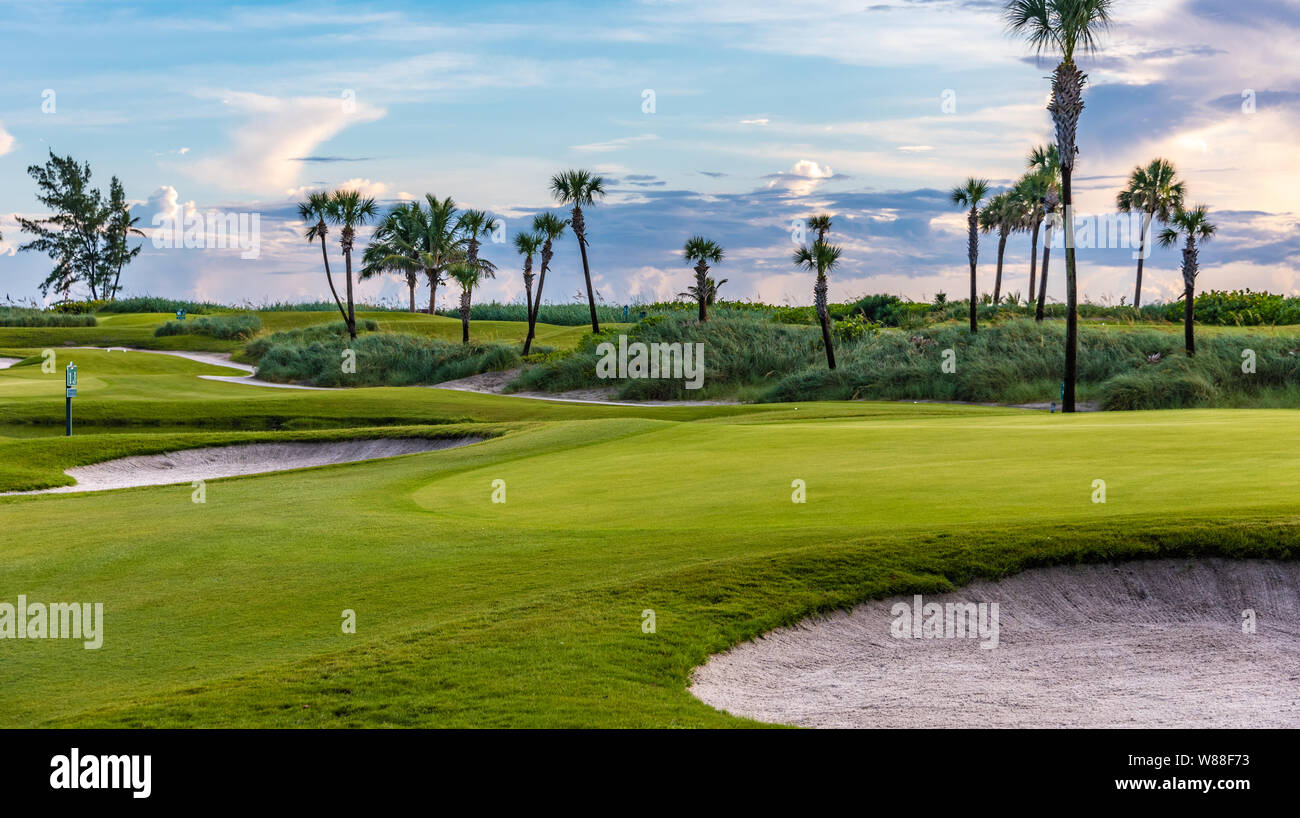 Early morning at Palm Beach Golf Course, a par 3 course bordered by the ocean on one side and the Intracoastal Waterway on the other in Palm Beach, FL Stock Photo