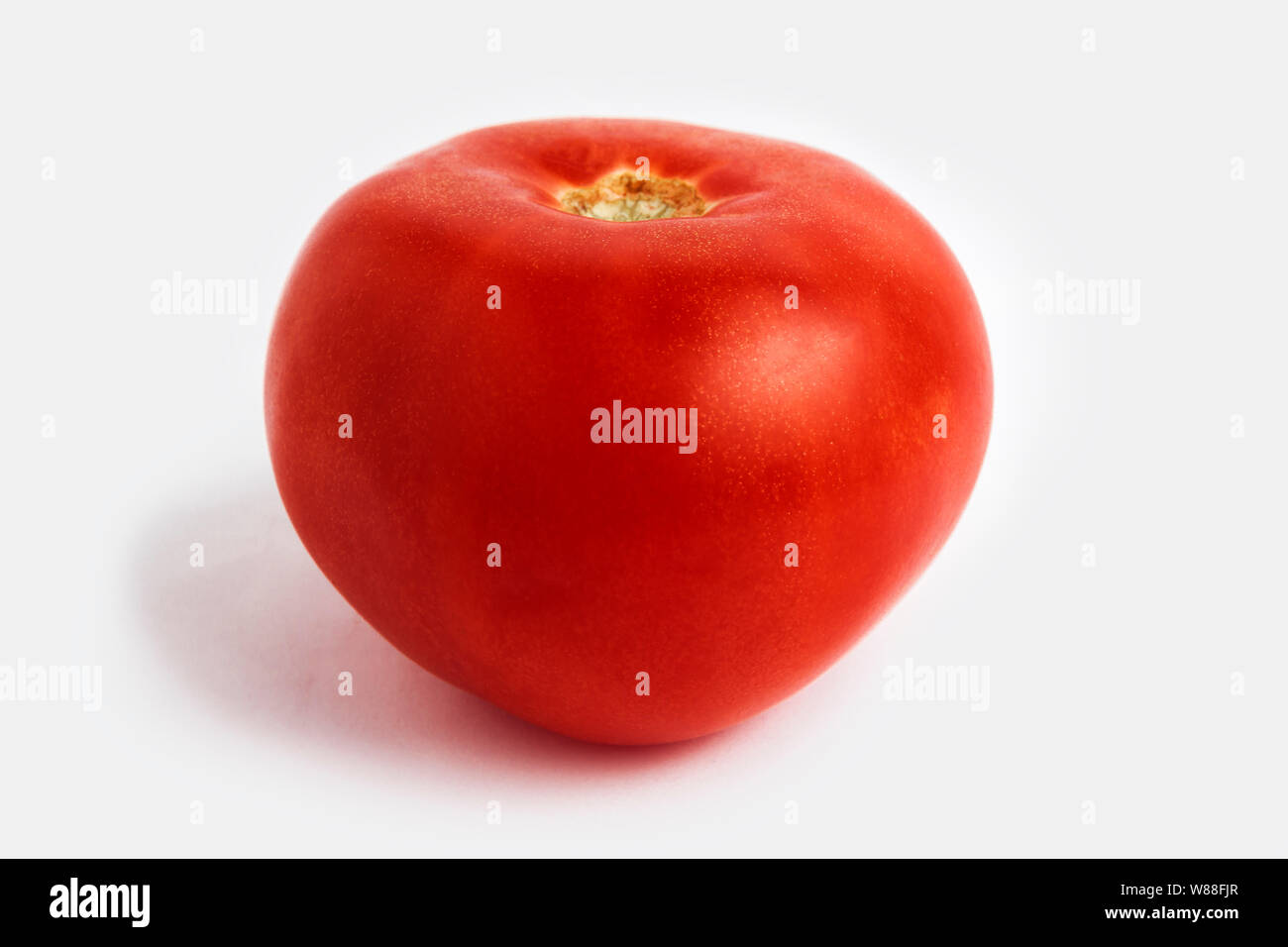 Tomato, close-up on a white background Stock Photo - Alamy