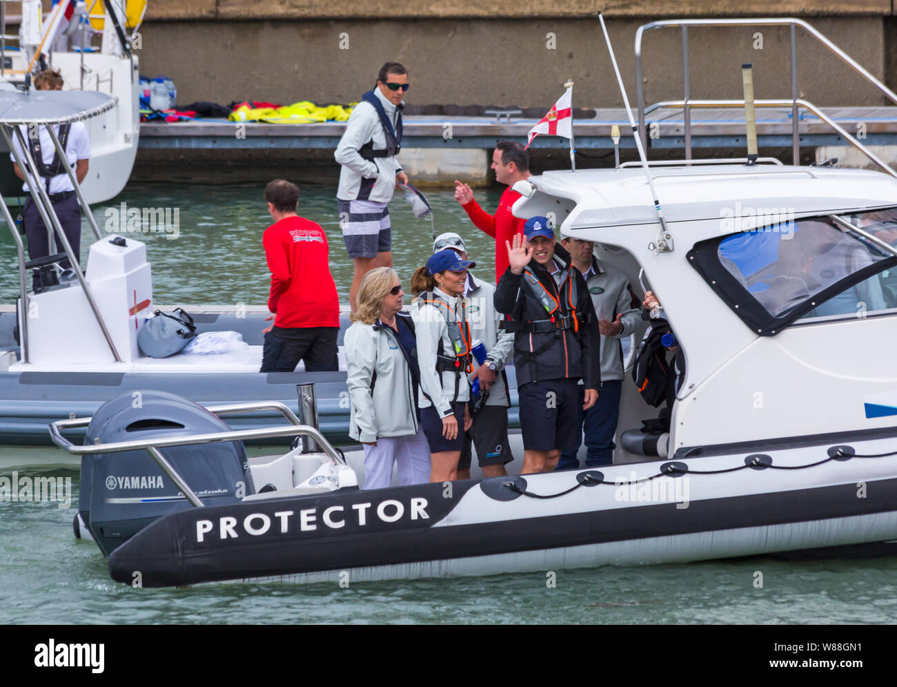 Cowes, Isle of Wight, Hampshire UK. 8th Aug 2019.  Kings Cup Sailing hosted by Duke and Duchess of Cambridge takes place a day early because of the weather forecast. Kate, Kate Middleton, and Will, Prince William, make their way to their boats on Targa Protector rigid hull inflatable boat RIB. Credit: Carolyn Jenkins/Alamy Live News Stock Photo