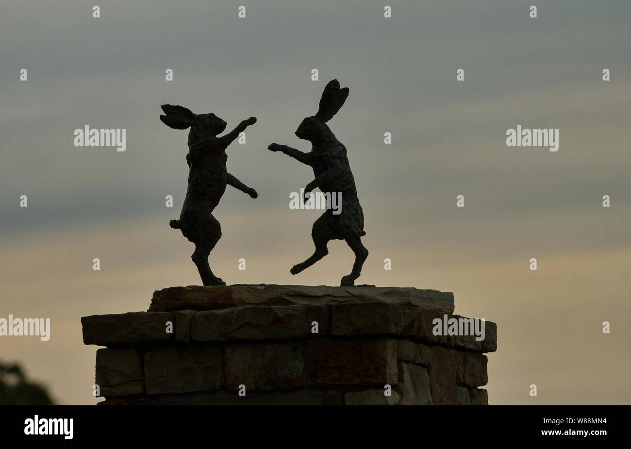 UNITED STATES - June 12, 2019: A statue of fighting rabbits rest on top ...