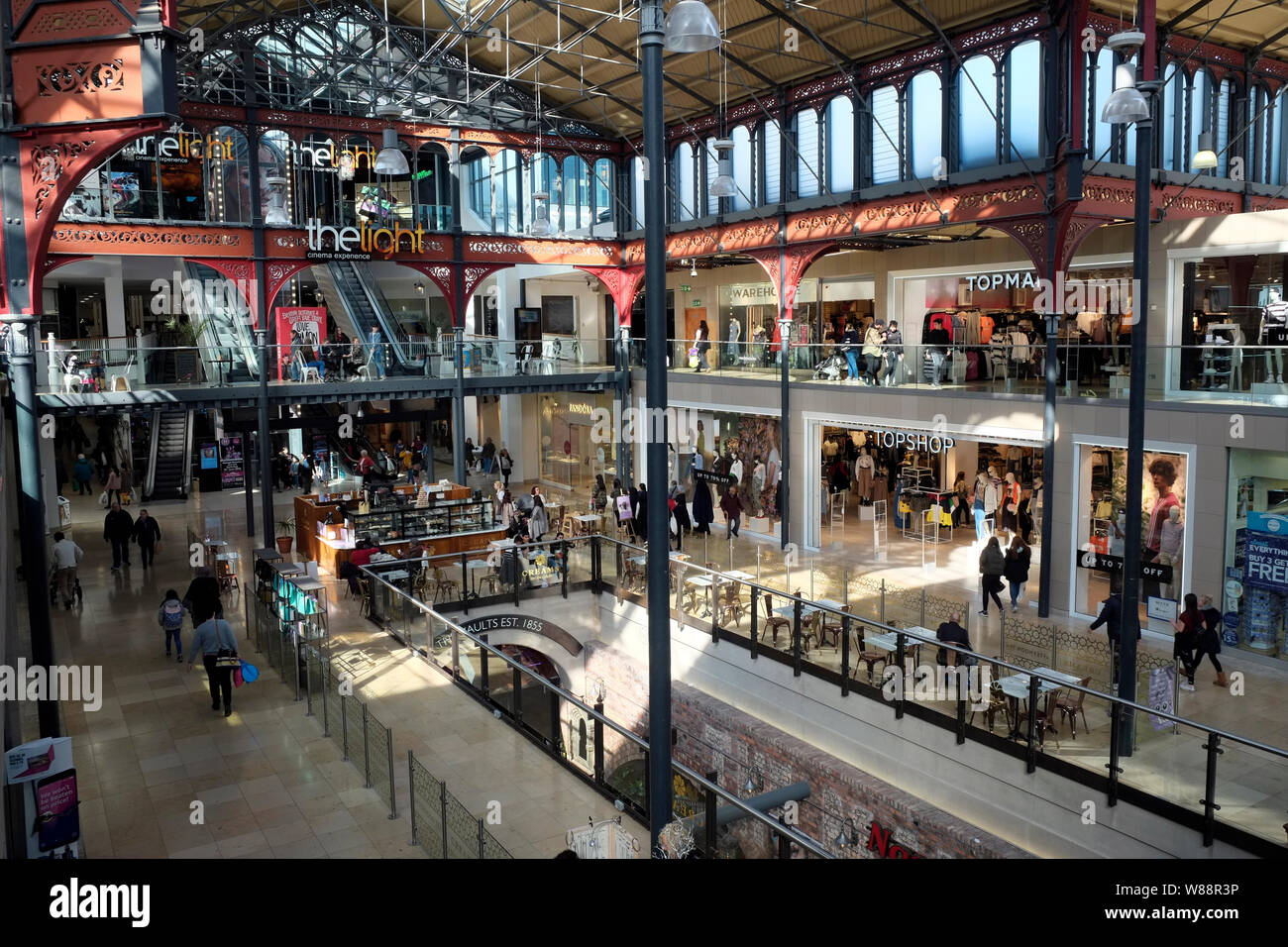 Bolton Market Place which has been converted into a modern shopping mall retaining the original Victorian ironwork of The Market Hall. photo DON TONGE Stock Photo