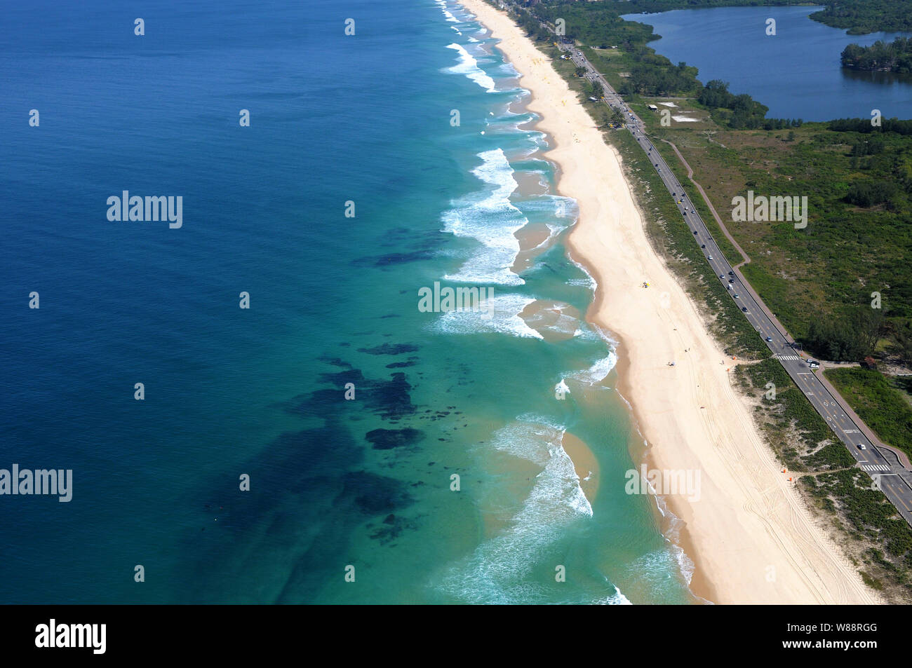 Aerial photo of the reserve beach with the Marapendi lagoon, located in the western zone of the city of Rio de Janeiro, Brazil. Stock Photo