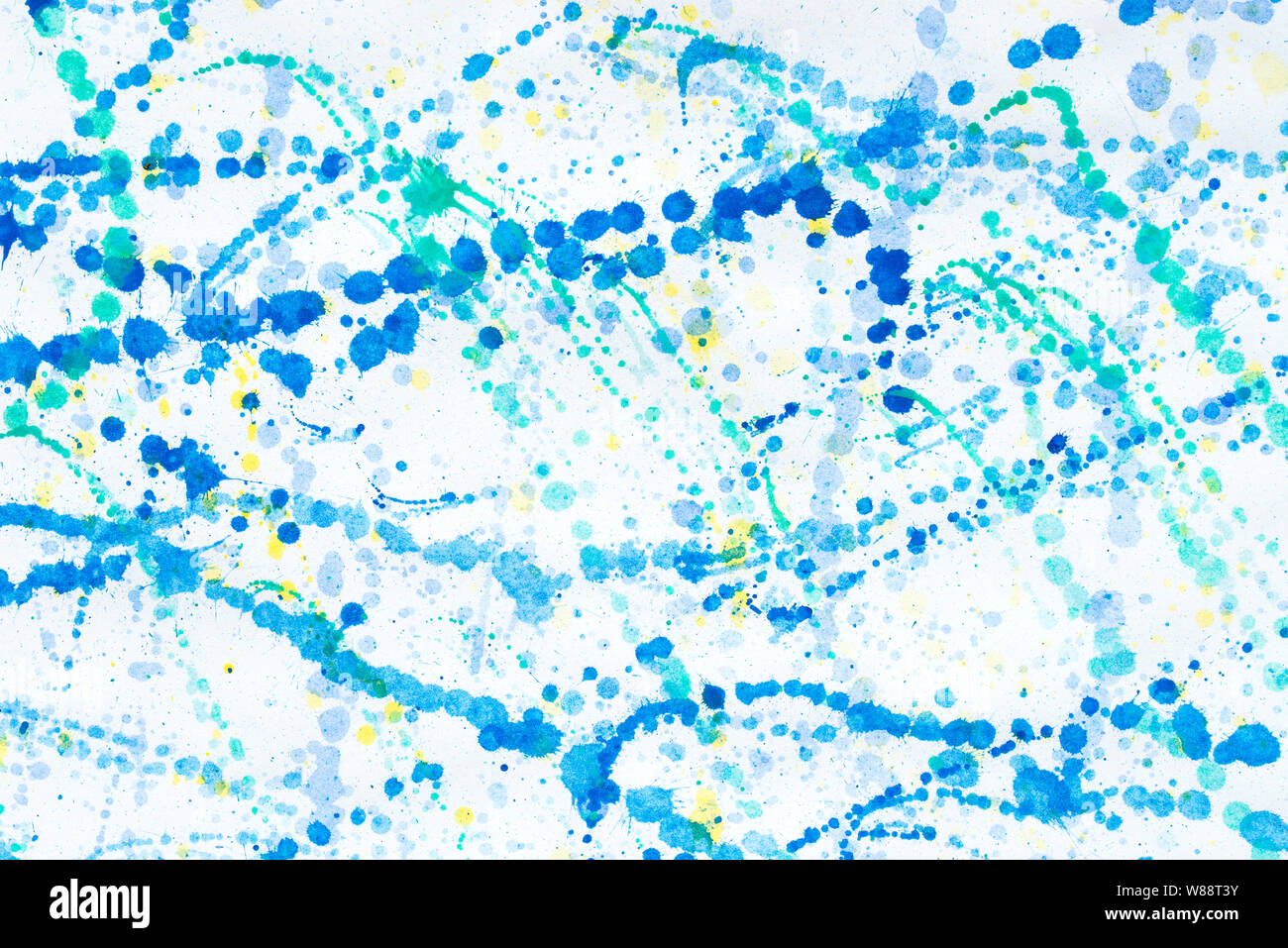 multicolored watercolor blots on white paper background texture Stock Photo