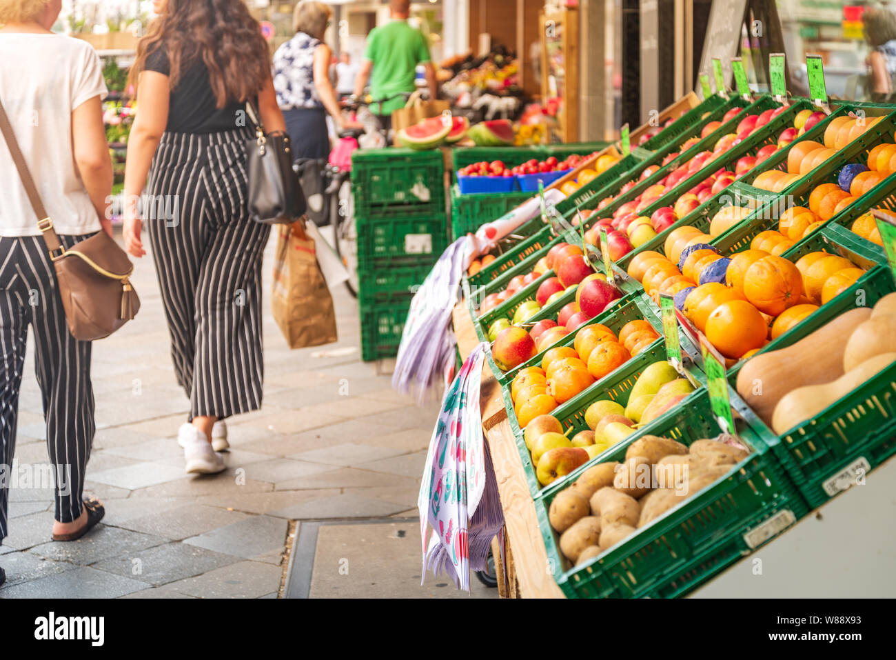 View of fresh various fruits sell on the plastic green basket on