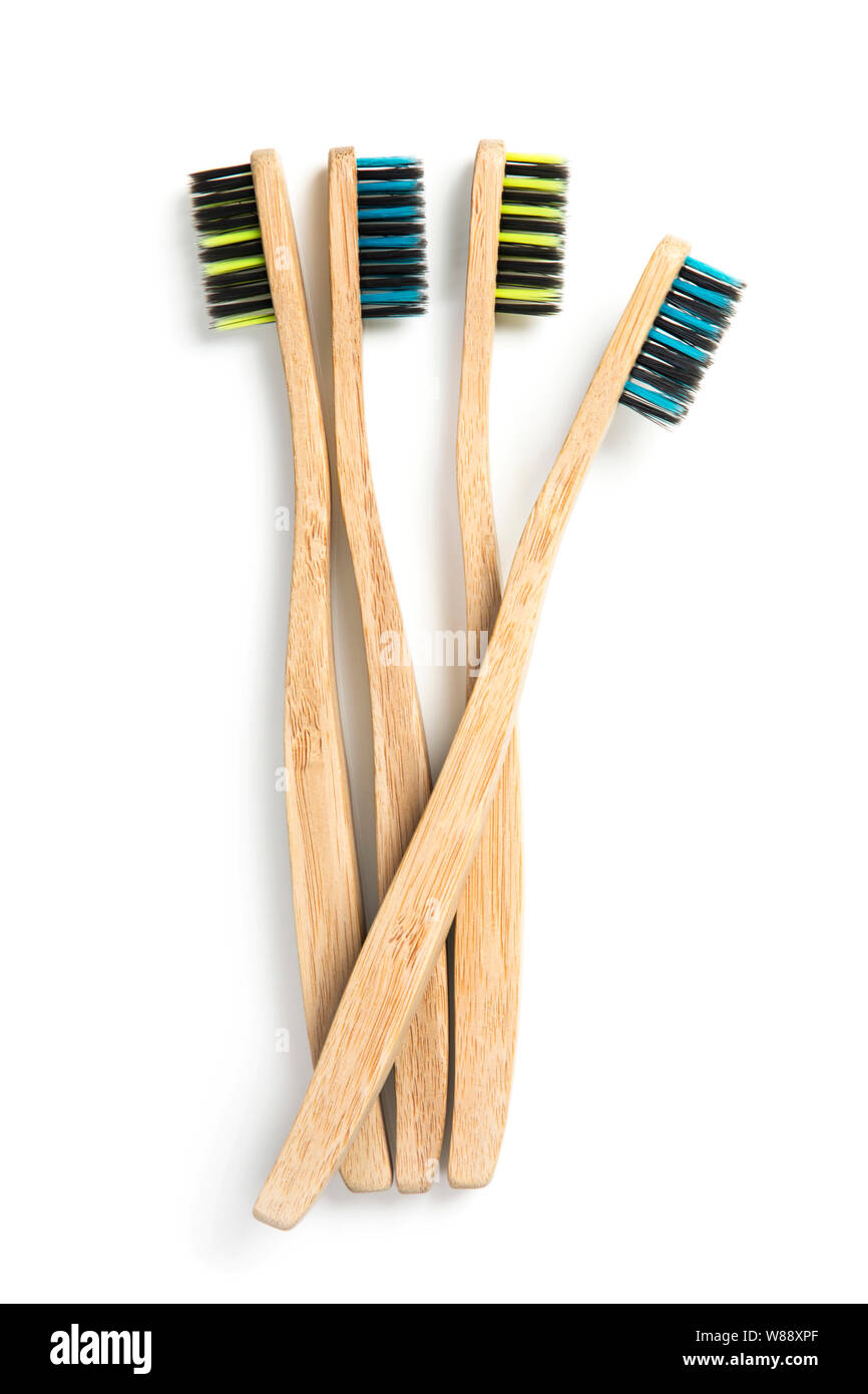 Eco friendly bamboo toothbrushes isolated on a white background Stock Photo