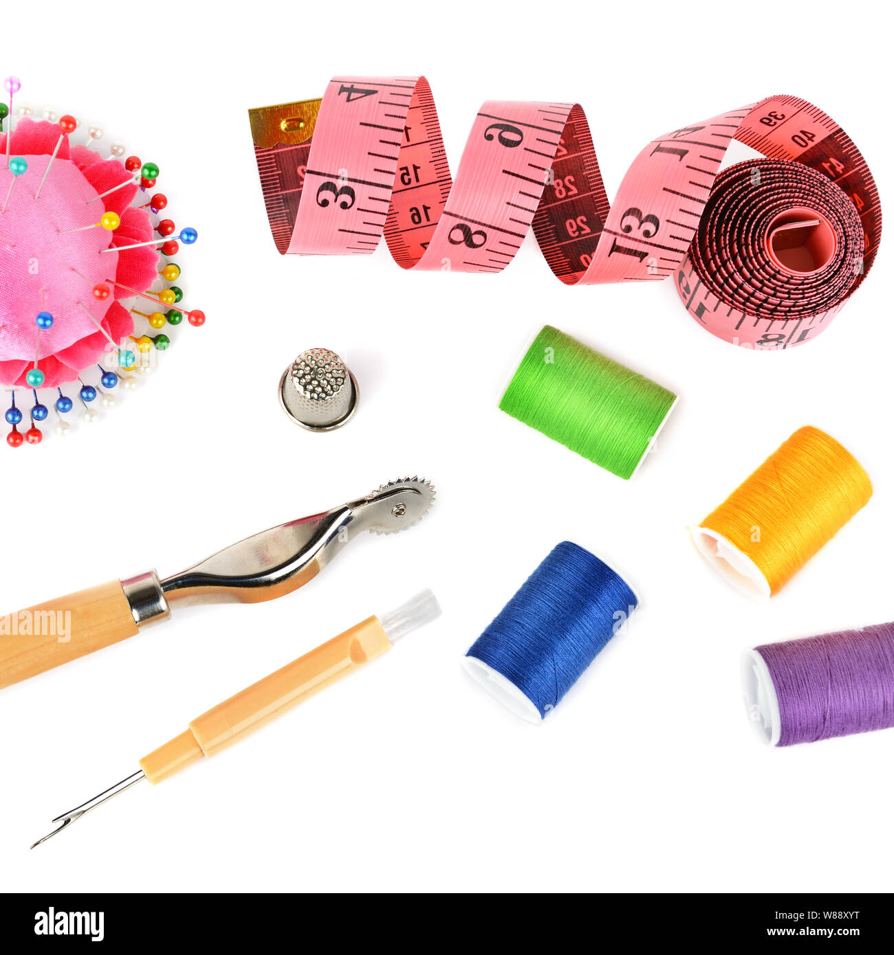 Composition with threads and sewing accessories isolated on white  background. Sewing pattern. Flat lay, top view Stock Photo - Alamy
