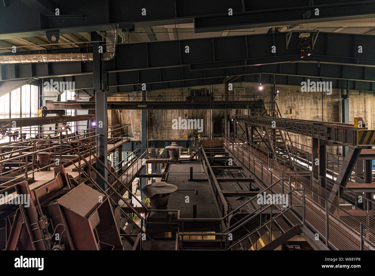 Typical interior view of former abandon coal mine industrial building and old rusty coal-washing plant and machine at Ruhr museum Zeche Zollverein. Stock Photo