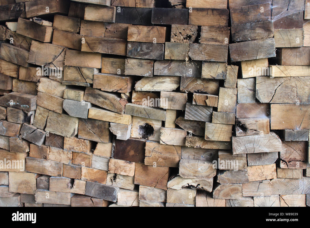 Blocks of Stacked Fire Wood Background Stock Photo