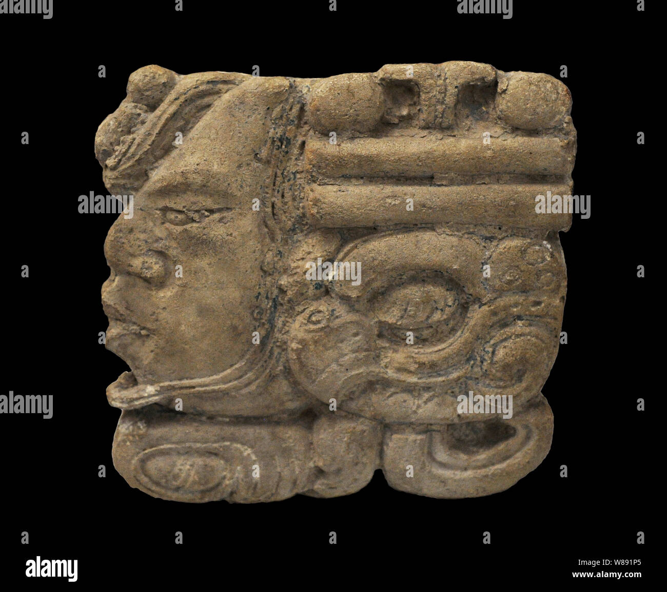 Numerical glyph depicting numeral 4. Palenque. Maya culture. Late Classic period (600-900 AD). Located on the facade of the Palace. It was collected in 1787 by captain Antonio del Rio. Stucco. Palenque, Mexico. Museum of the Americas. Madrid, Spain. Stock Photo