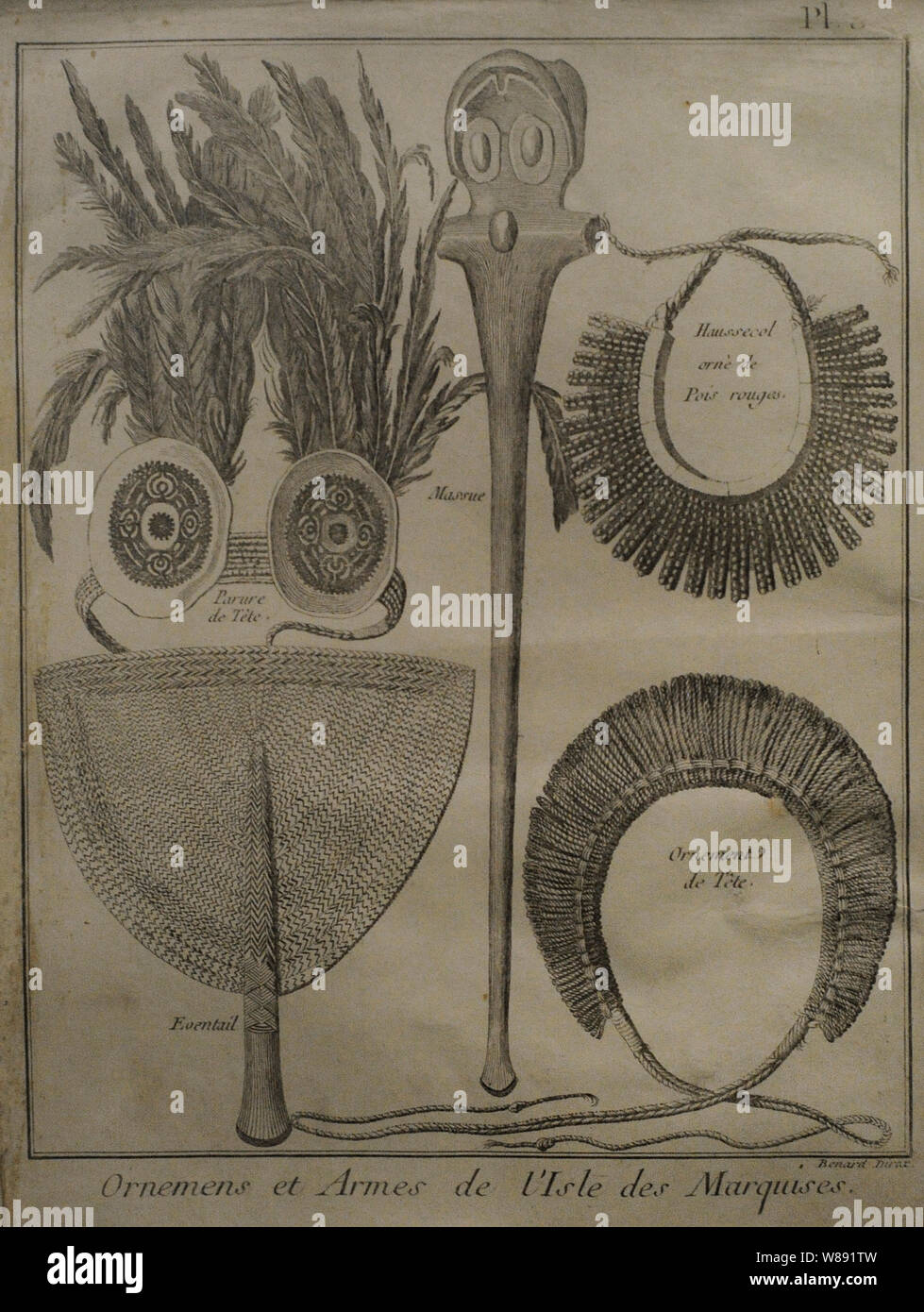 Ornaments and weapons of the Marquesas Islands. Engraving depicting decorative objects from the Marquesas Islands, visited by James Cook during his second Voyage of Discovery in the South Seas in 1774. It was engraved by Robert Benard (1734-1777), after William Hodges, and was published in the 1778 French edition of Captain James Cook 2nd Voyage of Discovery to the South Seas. A voyage towards the South Pole, and round the World. The five objects depicted are: headdress of feathers, fibre and shells, woven fan, ornamental club, neck dress with red seeds and headdress of woven fibre. Stock Photo