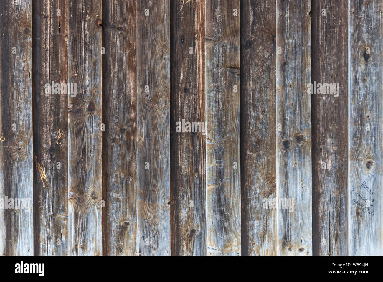 Vertical pattern rough old bumpy vintage barn wooden texture wall or  facade. Old timber exterior wall Stock Photo - Alamy