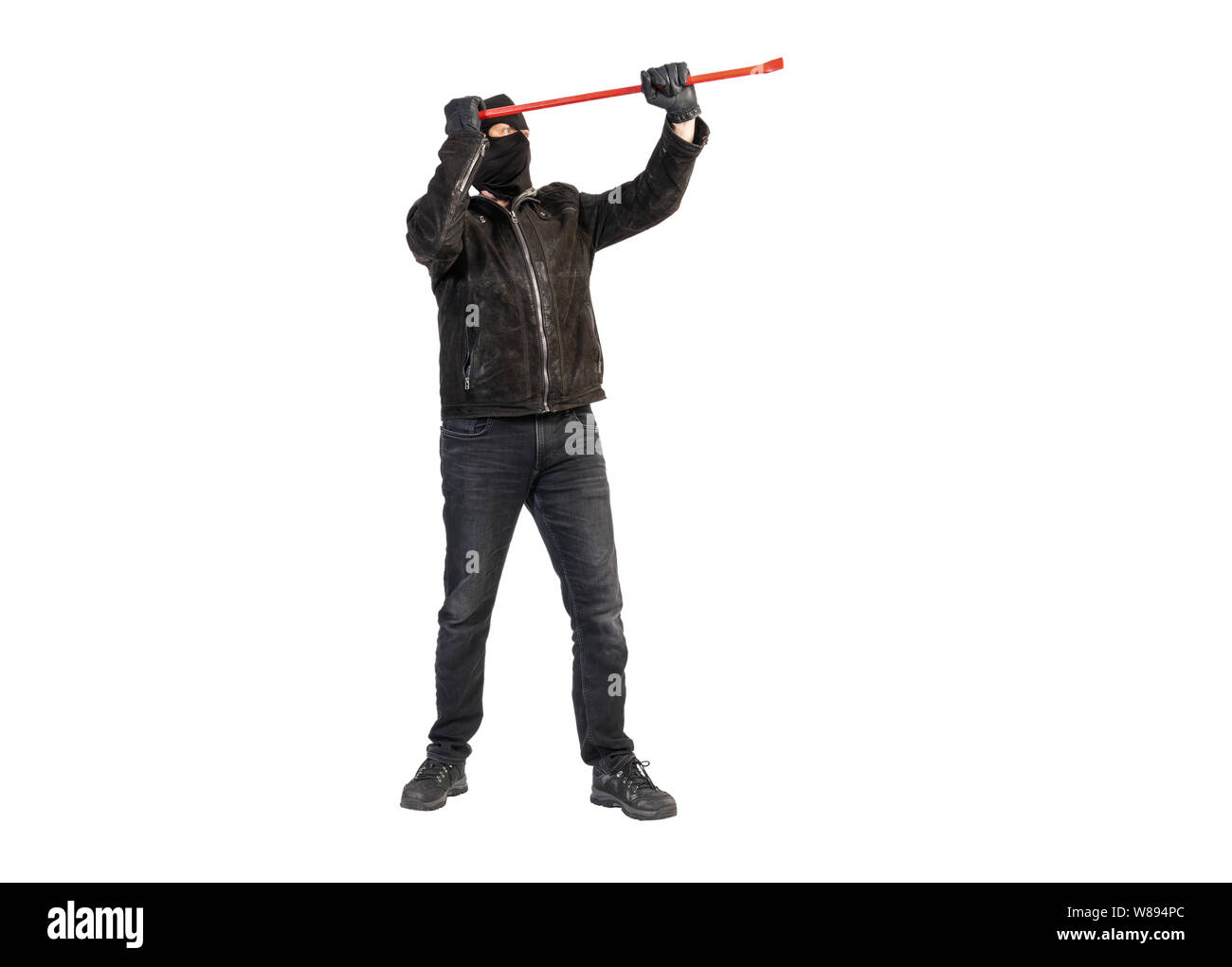 burglar with crowbar and mask against a white background Stock Photo