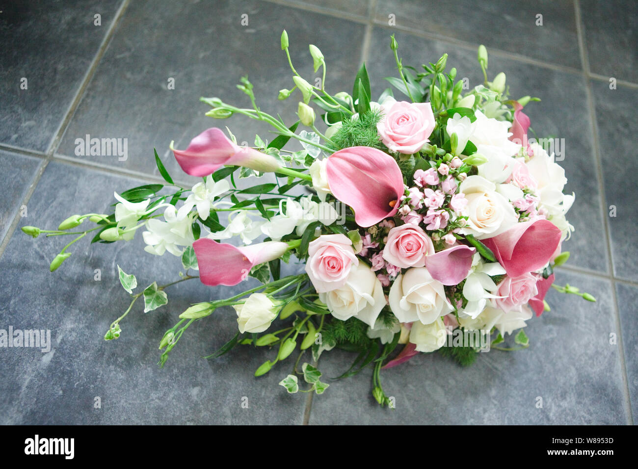 Wedding Flowers - White Rose and Pink Calla Lily Bouquet Stock Photo