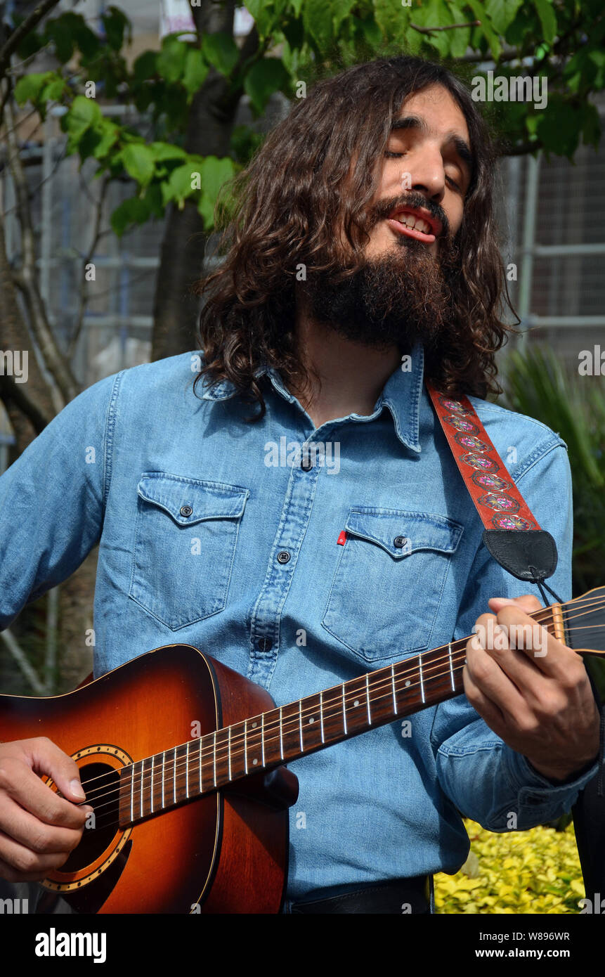 London, UK, 8 August 2019 Beatles tribute artist Momo of Chrys and Momo