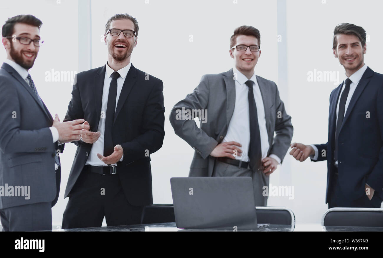 professional business team standing in the office Stock Photo - Alamy