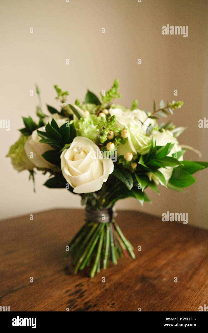 Wedding Flowers White Roses And Green Foliage Stock Photo Alamy