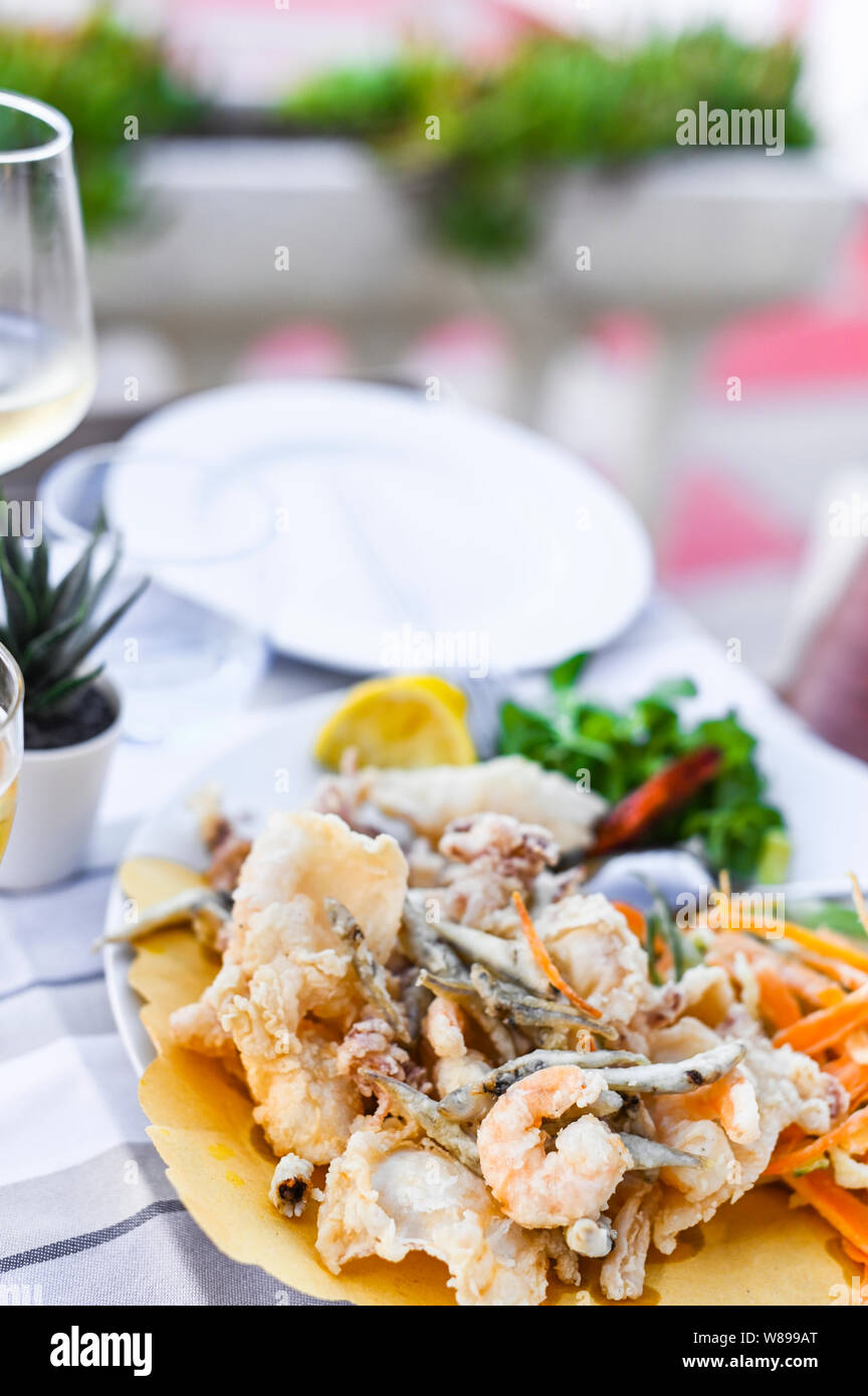Fried seafood mix. Seafood lunch at the restaurant. Traditional italian