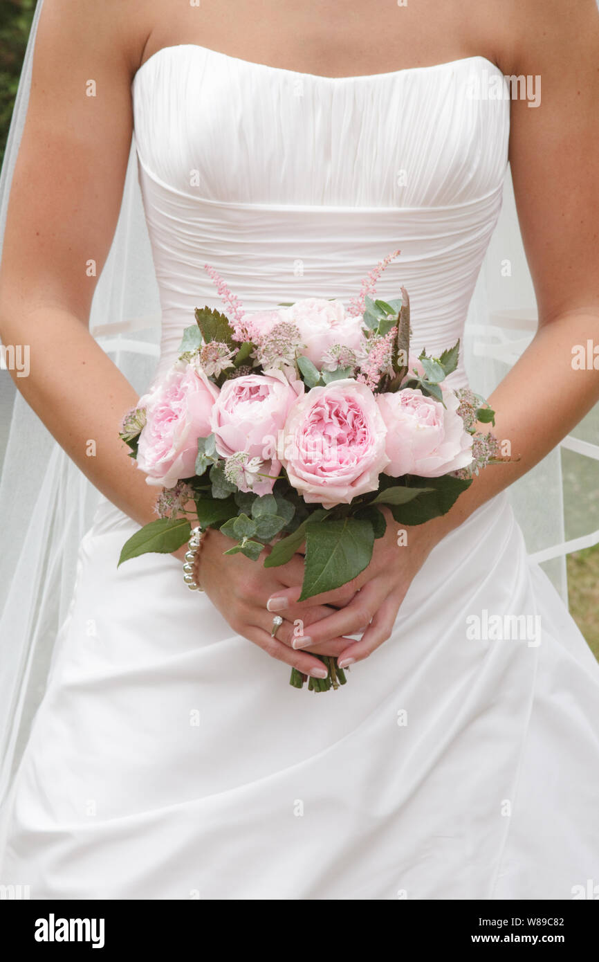 Bride Holding Wedding Bouquet Stock Photo Alamy