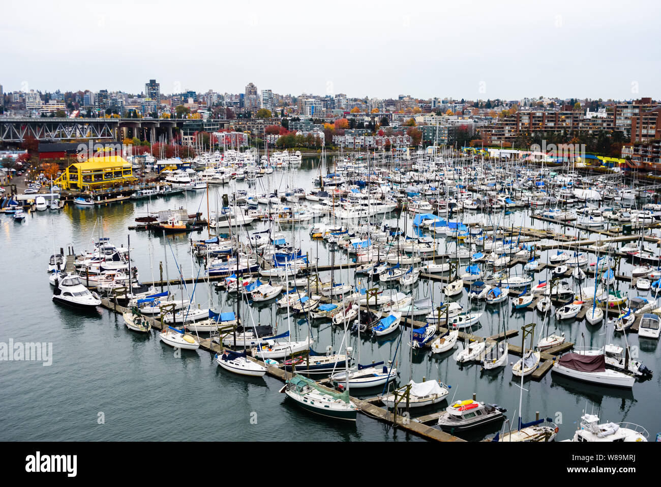 VANCOUVER, BC, CANADA - OCTOBER 27, 2018: The docks near Granville Island are conveniently located with easy access to downtown. Stock Photo