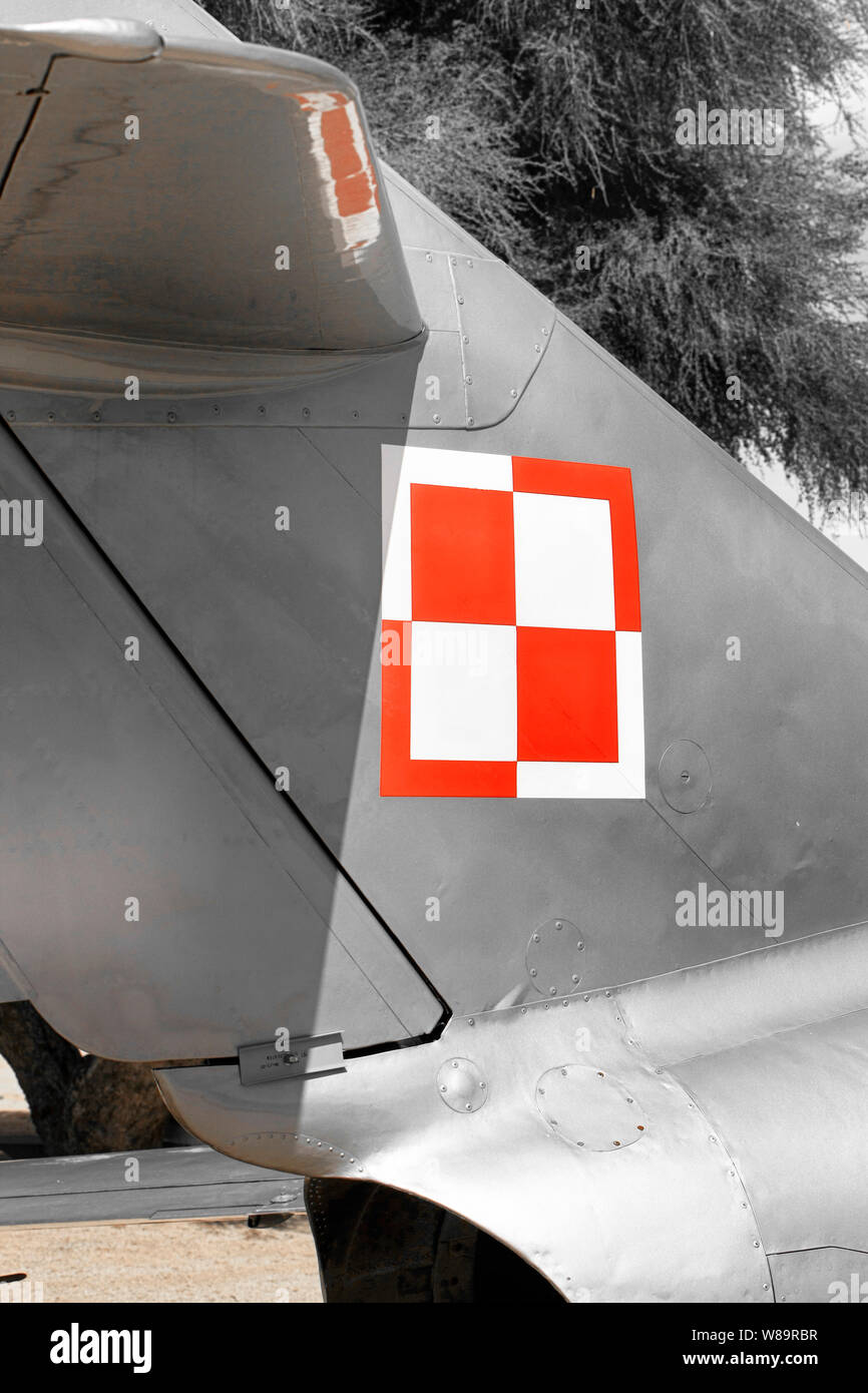 A Polish Air Force insignia on the tail section of a Mig jet fighter plane Stock Photo
