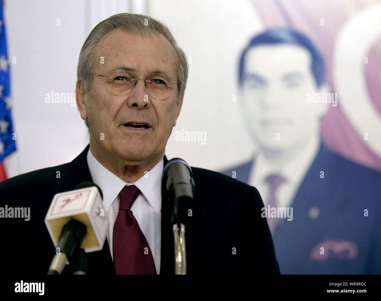 Secretary of Defense Donald H. Rumsfeld speaks to the press during a joint media availability with Tunisian Minister of National Defense Kamel Morjane in Tunis, Tunisia, on Feb. 11, 2006.  Rumsfeld met with delegations from the Mediterranean Dialogue countries of Algeria, Egypt, Israel, Jordan, Mauritania, Morocco and Tunisia earlier at the NATO Ministerial in Taormina, Sicily.  Rumsfeld is in Tunisia for bi-lateral meetings with his counterparts to continue those talks and discuss regional security issues. Stock Photo