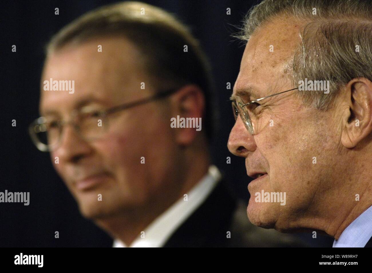 Secretary of Defense Donald H. Rumsfeld (right) and Vice Chairman of the Joint Chiefs of Staff Admiral Edmund Giambastiani, U.S. Navy, answer questions during a Pentagon press briefing in Arlington, Va., on Feb. 1, 2006.  Rumsfeld and Giambastiani talked to reporters about the pending Quadrennial Defense Review and the continued Global War on Terrorism. Stock Photo