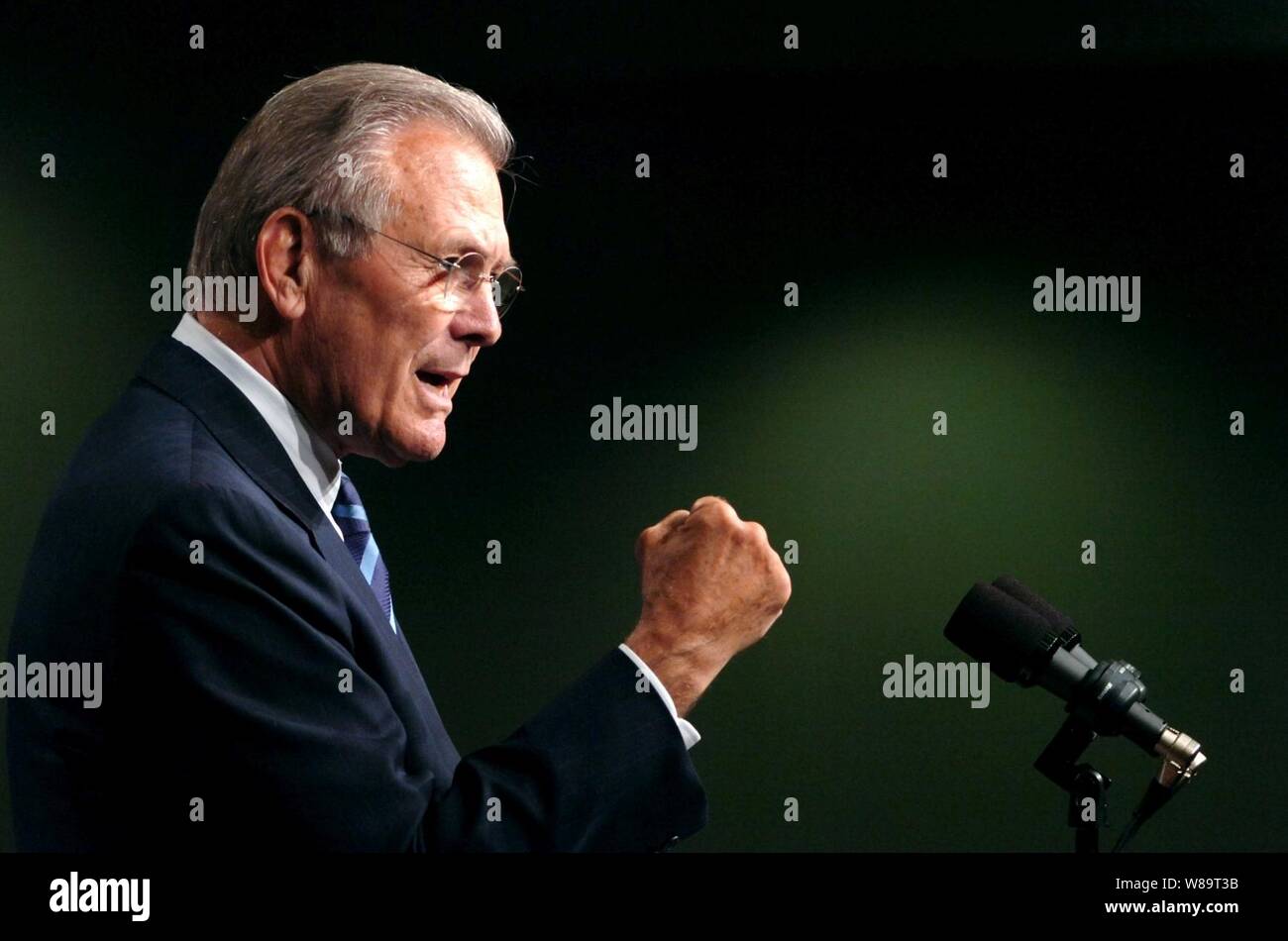 Secretary of Defense Donald H. Rumsfeld addresses Pentagon civilian employees and service members during a town hall meeting on May 19, 2006. Rumsfeld and Chairman of the Joint Chiefs of Staff Gen. Peter Pace, U.S. Marine Corps, answered questions and thanked the audience for their hard work and devotion. Stock Photo