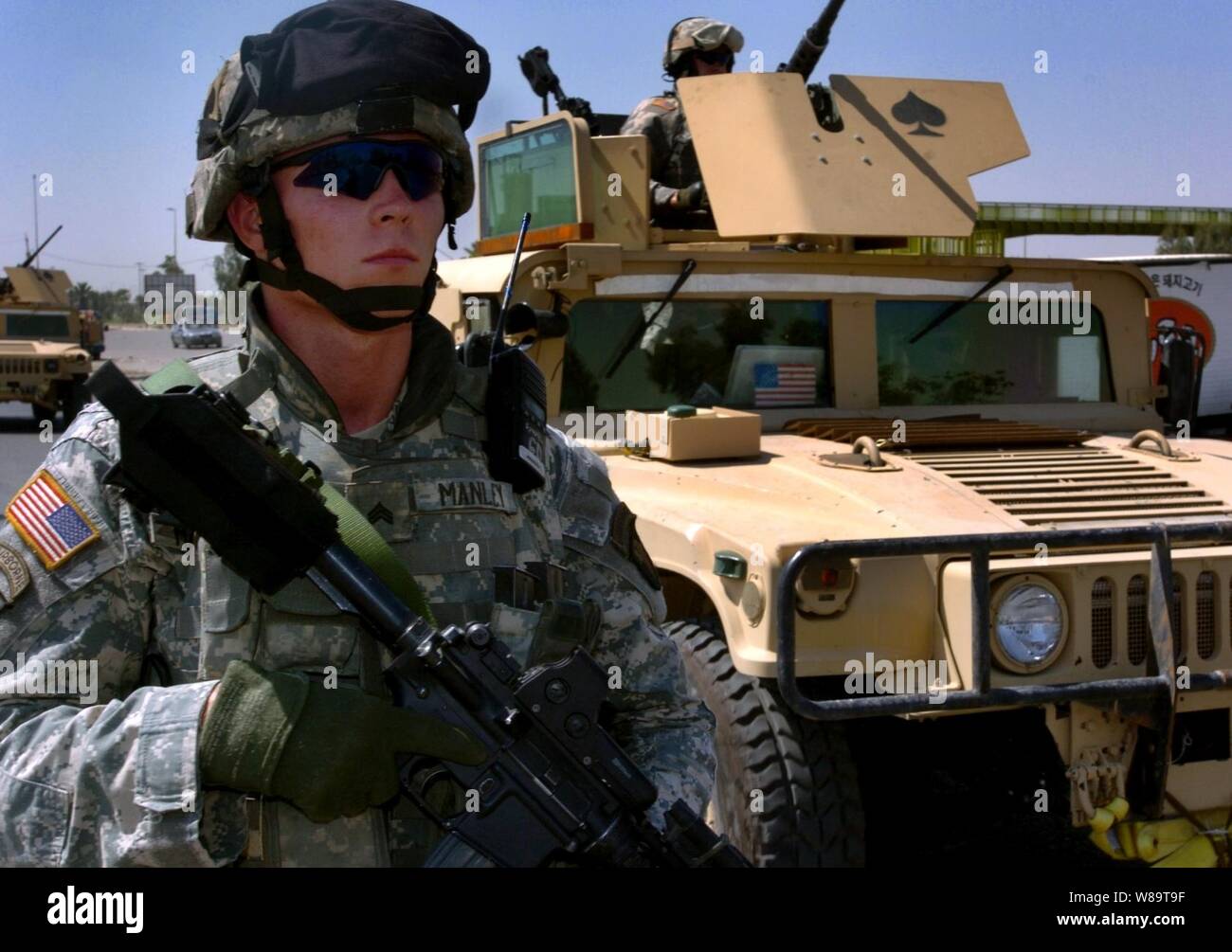 U.S. Army Sgt. Jason Manley conducts a dismounted patrol in Adhamiya near Baghdad, Iraq, on June 27, 2006.  Manley is assigned to the 506th Regimental Combat Team, 101st Airborne Division. Stock Photo