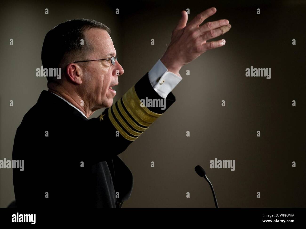 Chairman of the Joint Chiefs of Staff Adm. Mike Mullen, U.S. Navy, addresses the Heritage Foundation in Washington, D.C., on April 15, 2008.  The Heritage Foundation is an educational institute whose mission is to formulate and promote conservative public policies based on the principles of free enterprise, limited government, individual freedom, traditional American values, and a strong national defense. Stock Photo