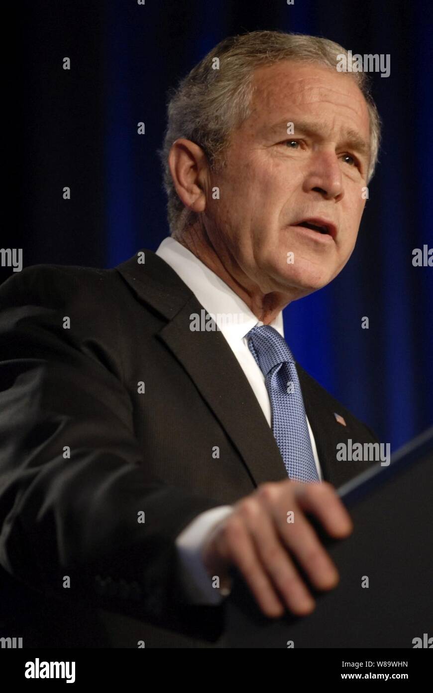 President George W. Bush speaks to the audience in the Pentagon auditorium on March 19, 2008.  Bush addressed members of the Armed Forces, Department of Defense and Department of State employees about the progress made in Iraq and the Global War on Terror. Stock Photo