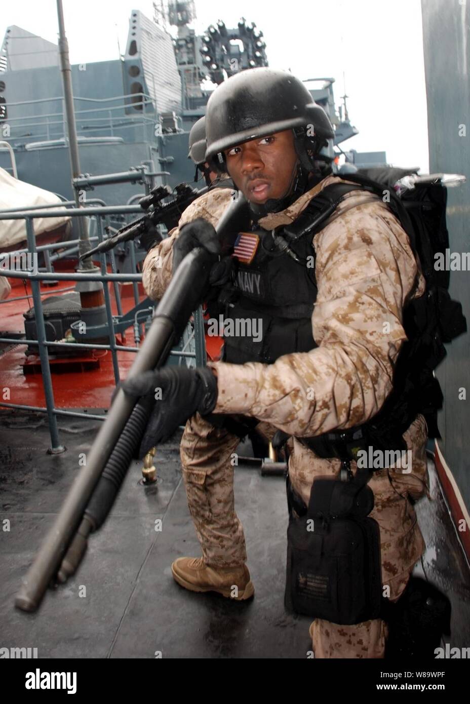 U.S. Navy Petty Officer 2nd Class Gary Weaver scans his area before allowing the visit, board, search and seizure team assigned to the guided-missile frigate USS Elrod (FFG 55) to move forward to the bridge of the Russian anti-submarine warfare ship museum Severomorsk during Northern Eagle 2008 in the Norwegian Sea on July 22, 2008.  Northern Eagle is a 12-day exercise involving the United States, Russia and Norway in the Norwegian and Barents Seas that focuses on maritime interdiction operations, search and rescue and tactical interoperability to improve maritime safety and security in Northe Stock Photo