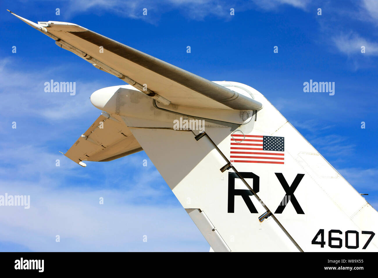 Rudder assemby of a US Navy Douglas C-9-32 with the US flag prominent just below the elevators Stock Photo