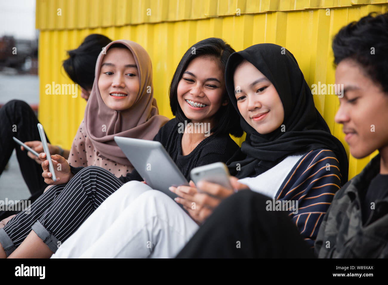 young people hanging out together Stock Photo - Alamy