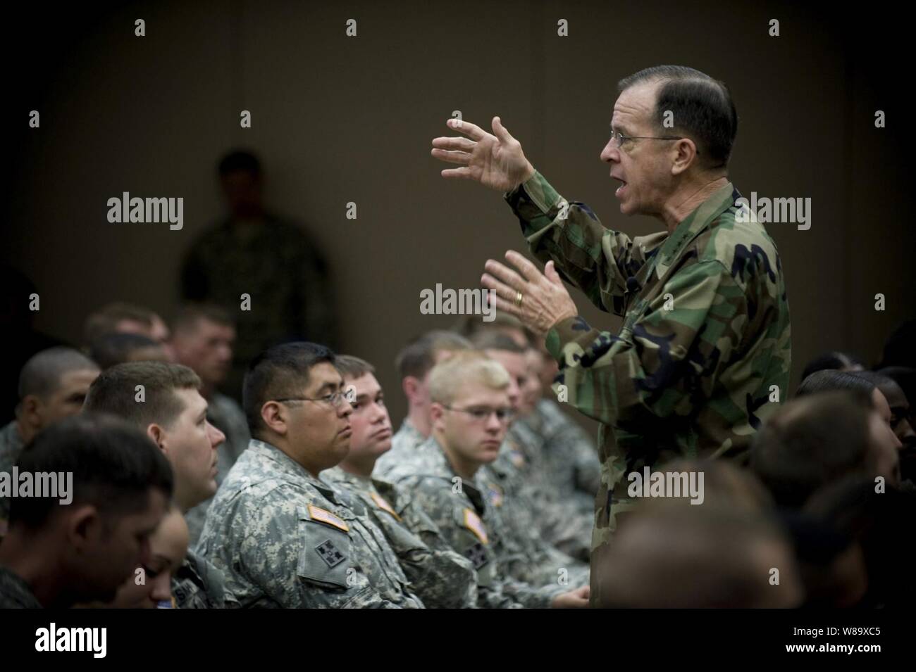 Chairman of the Joint Chiefs of Staff Adm. Mike Mullen, U.S. Navy, answers questions during an all-hands call with soldiers assigned to Fort Hood, Texas, on April 16, 2009.  Mullen is on a four-day tour of installations visiting service members in the Lone Star state. Stock Photo