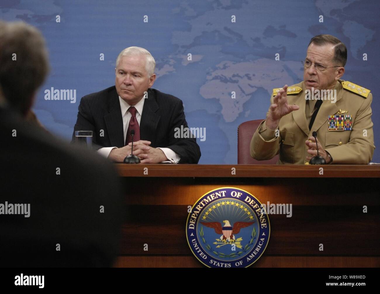 Secretary of Defense Robert M. Gates (left) and Chairman of the Joint Chiefs of Staff Adm. Michael Mullen, U.S. Navy, conduct a press briefing where they announce Army Lt. Gen. Stanley McChrystal is to replace Army Gen. David D. McKierna as commander of NATO's International Security Assistance Force and U.S. forces in Afghanistan in the Pentagon on May 11, 2009. Stock Photo