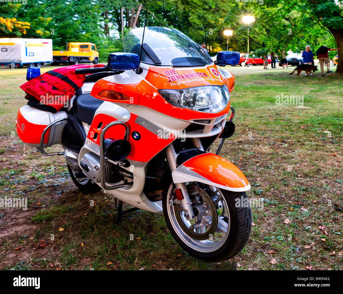 Laubach, Germany, 08/03/2019:Vehicle from the Johanniter motorcycle squadron parked in the castle garden Laubach for emergencies Stock Photo