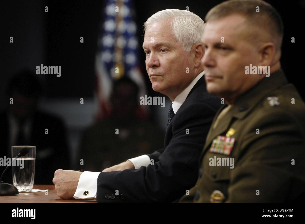 Secretary of Defense Robert M. Gates (left) and Vice Chairman of the Joint Chiefs of Staff Gen. James E. Cartwright answer questions from reporters during a press briefing in the Pentagon on Sept. 17, 2009. Stock Photo