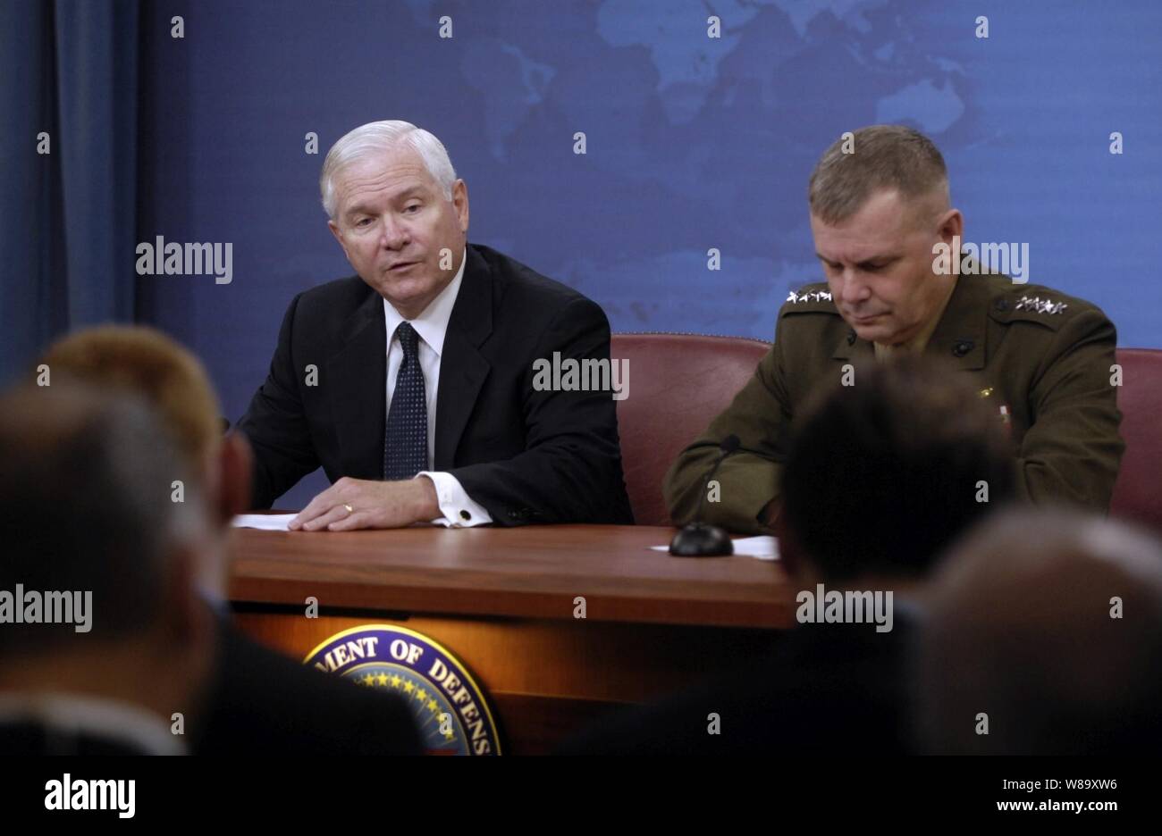 Secretary of Defense Robert M. Gates (left) and Vice Chairman of the Joint Chiefs of Staff Gen. James E. Cartwright answer questions from reporters during a press briefing in the Pentagon on Sept. 17, 2009. Stock Photo