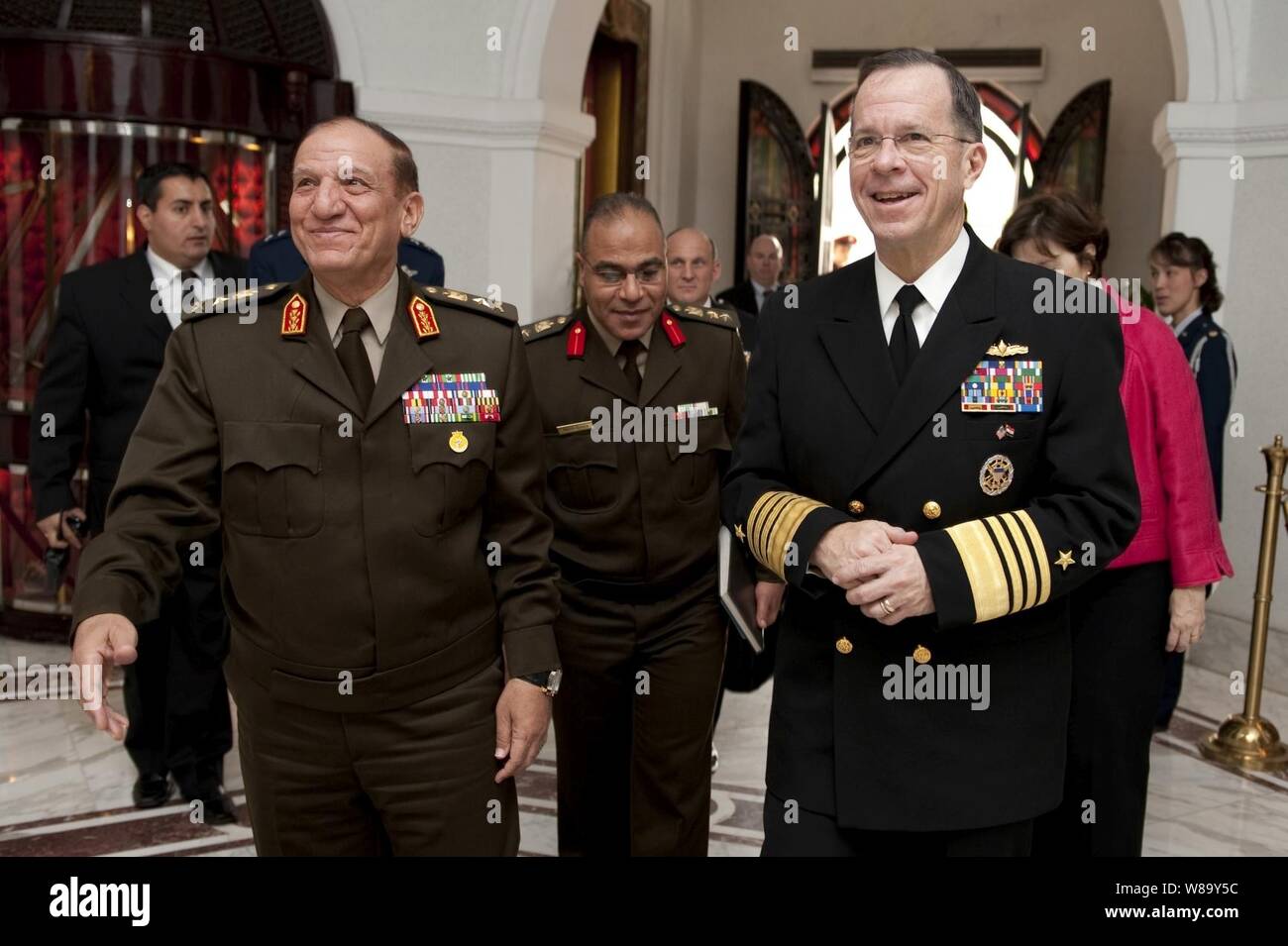 Chairman of the Joint Chiefs of Staff Adm. Mike Mullen, U.S. Navy, is greeted by Egyptian Armed Forces Chief of Staff Lt. Gen. Sami Hafez Enan in Cairo on Feb. 14, 2010.  Mullen is on a weeklong tour of the region visiting with key partners and allies. Stock Photo