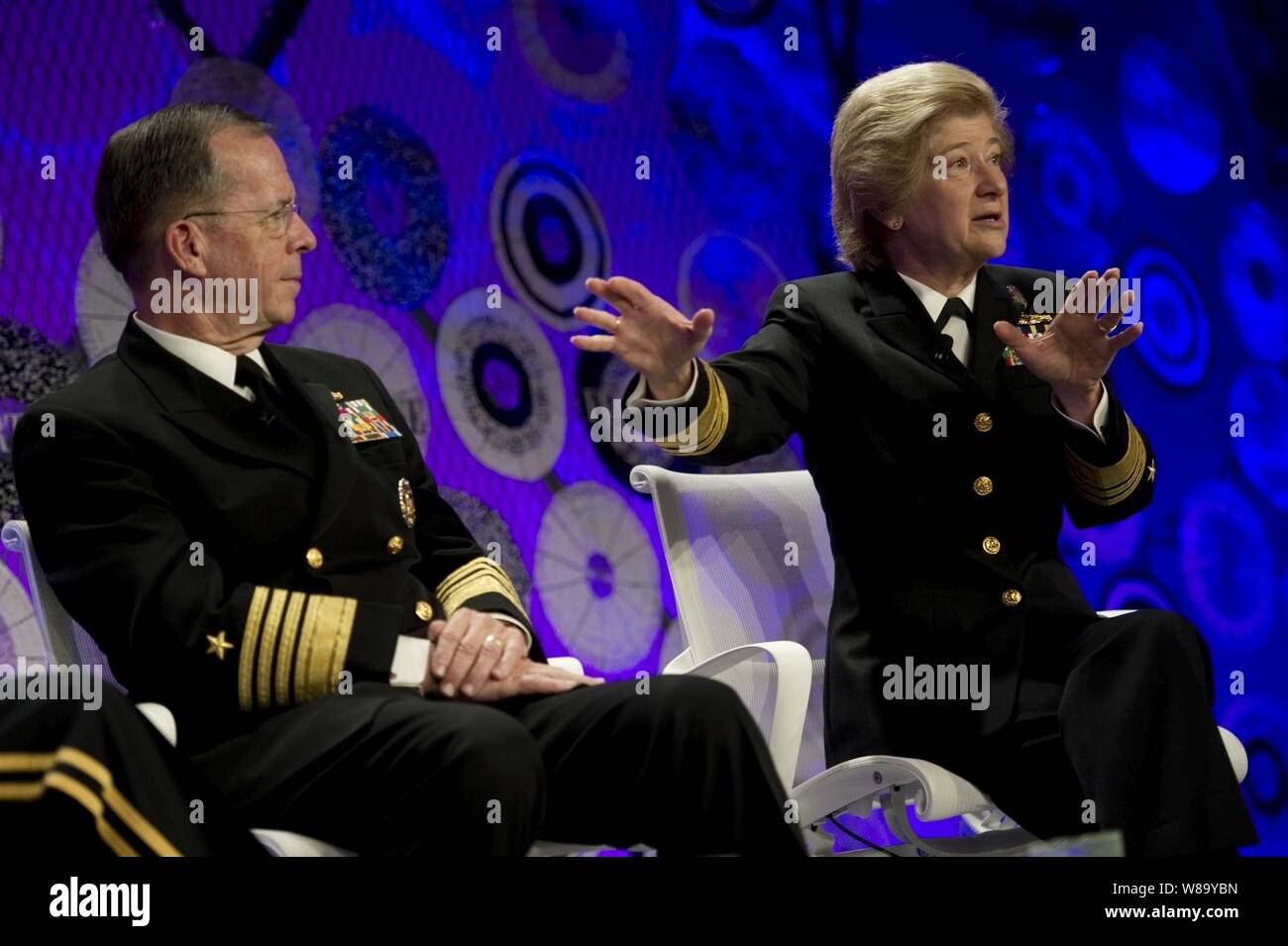Chairman of the Joint Chiefs of Staff Adm. Mike Mullen, U.S. Navy, Gen. Ann Dunwoody and President of National Defense University Vice Adm. Ann Rondeau address audience members at the Fortune magazine's Most Powerful Women Summit in Washington, D.C., on Oct. 6, 2010. Stock Photo