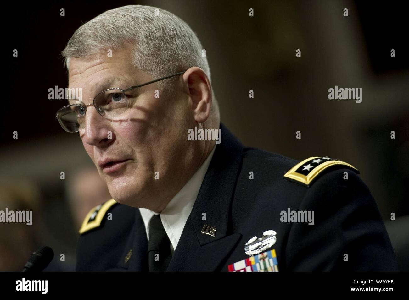 Commander, U.S. Army Europe Gen. Carter Ham appears before the Senate Armed Services Committee regarding the findings of the 'Don't Ask, Don't Tell' Comprehensive Working Group report on Dec. 2, 2010.  Secretary of Defense Robert M. Gates, Chairman of the Joint Chiefs of Staff Adm. Mike Mullen and Department of Defense General Counsel Jeh C. Johnson appeared before the committee regarding the findings of the survey. Stock Photo