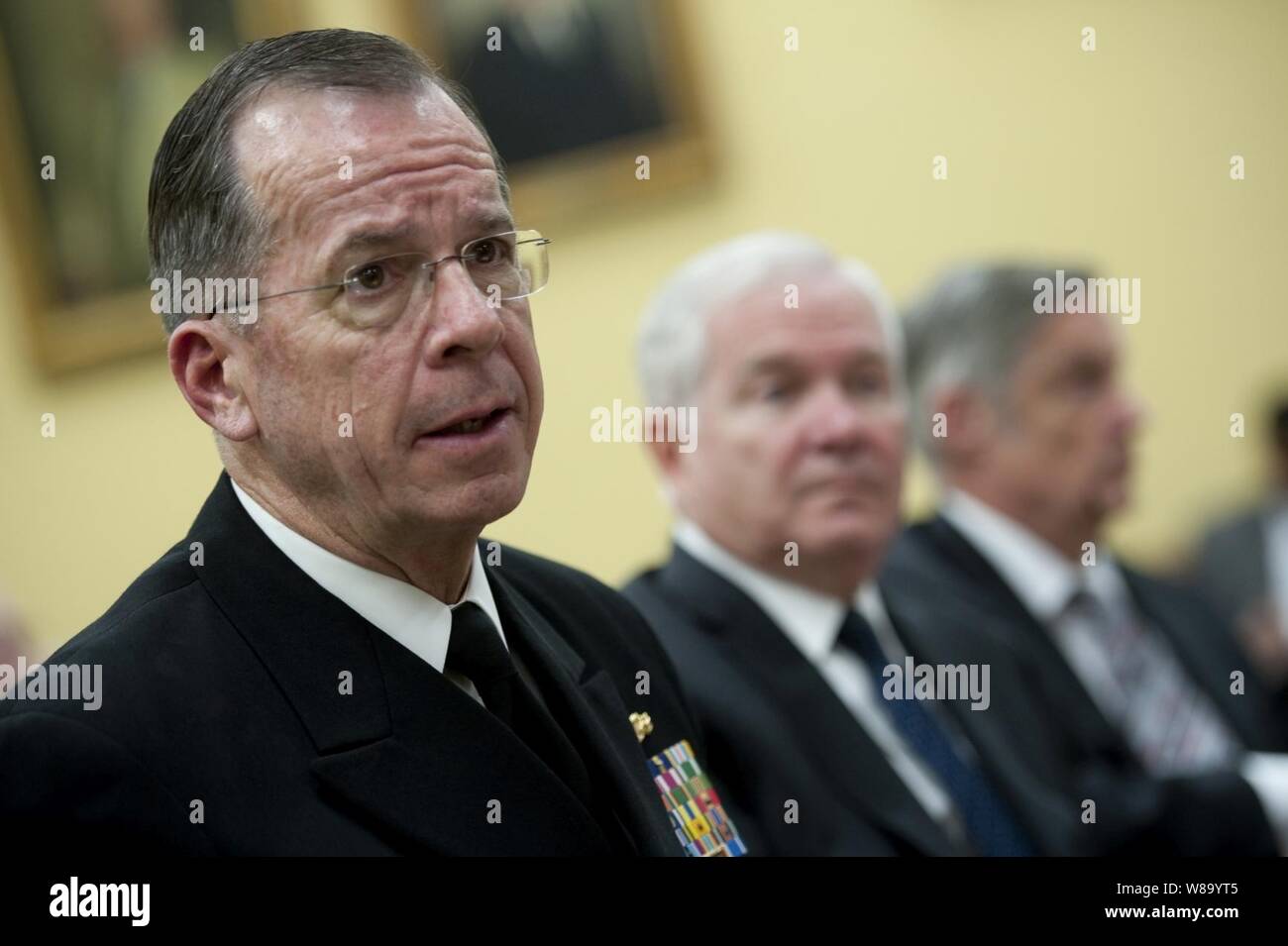 Chairman of the Joint Chiefs of Staff Adm. Mike Mullen, Secretary of Defense Robert M. Gates and Under Secretary of Defense for Comptroller Robert Hale testify at a hearing of the House Appropriations Committee on the fiscal 2012 budget at the Rayburn House Office Building in Washington, D.C., on March 3, 2011. Stock Photo