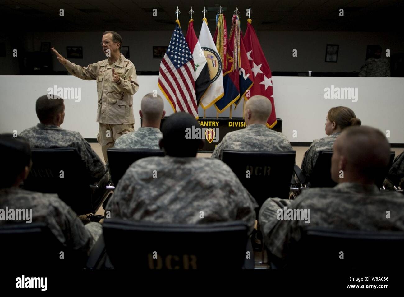 Chairman of the Joint Chiefs of Staff Adm. Mike Mullen addresses soldiers assigned to the 1st Infantry Division's 2nd Advise and Assist Brigade at the U.S. Division Center at Camp Liberty, Iraq, on April 22, 2011.  Mullen is in the Central Command area of operation supporting a USO tour to the region and talking to counterparts and service members stationed in the area. Stock Photo