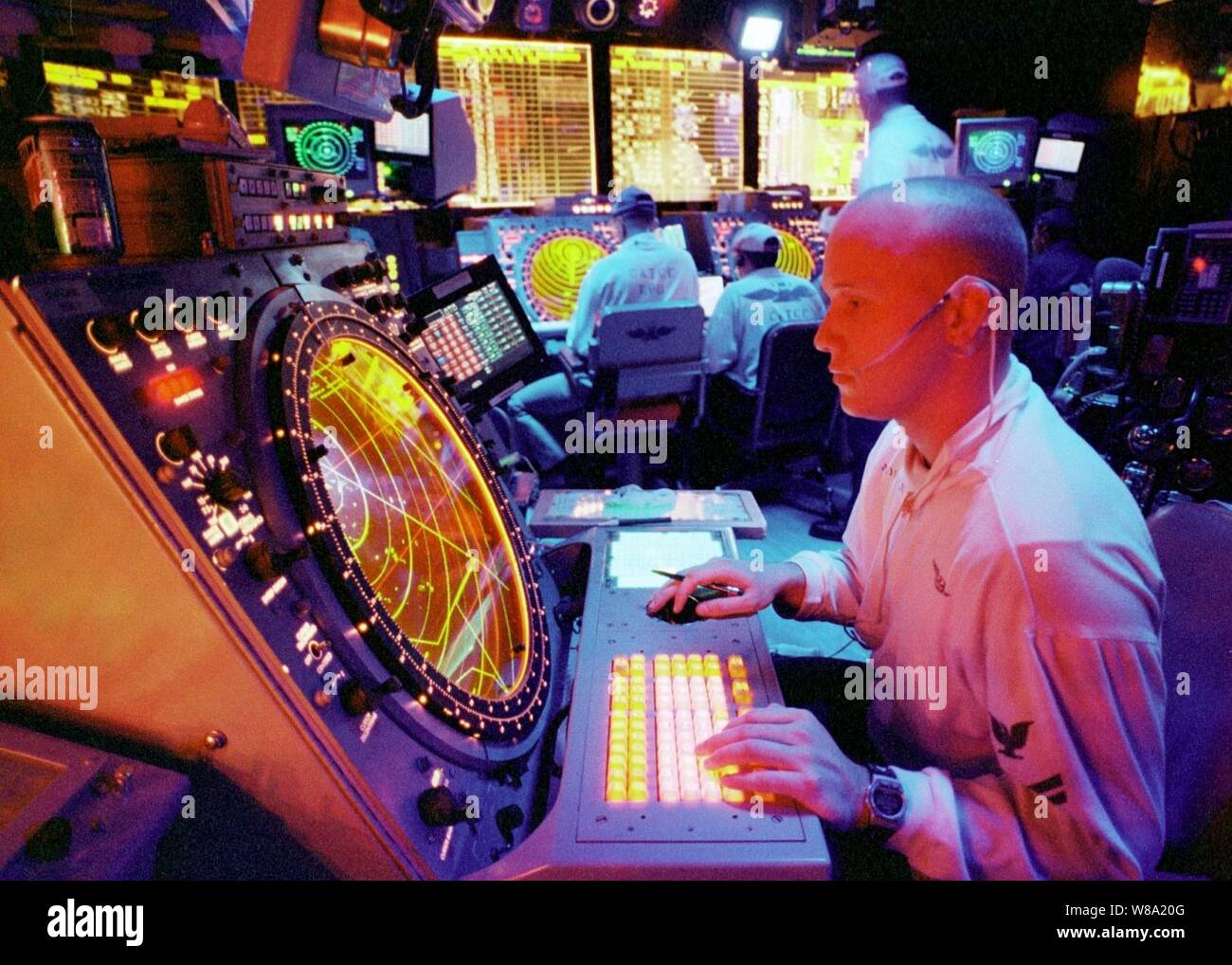 Air traffic controllers in the Carrier Air Traffic Control Center on ...