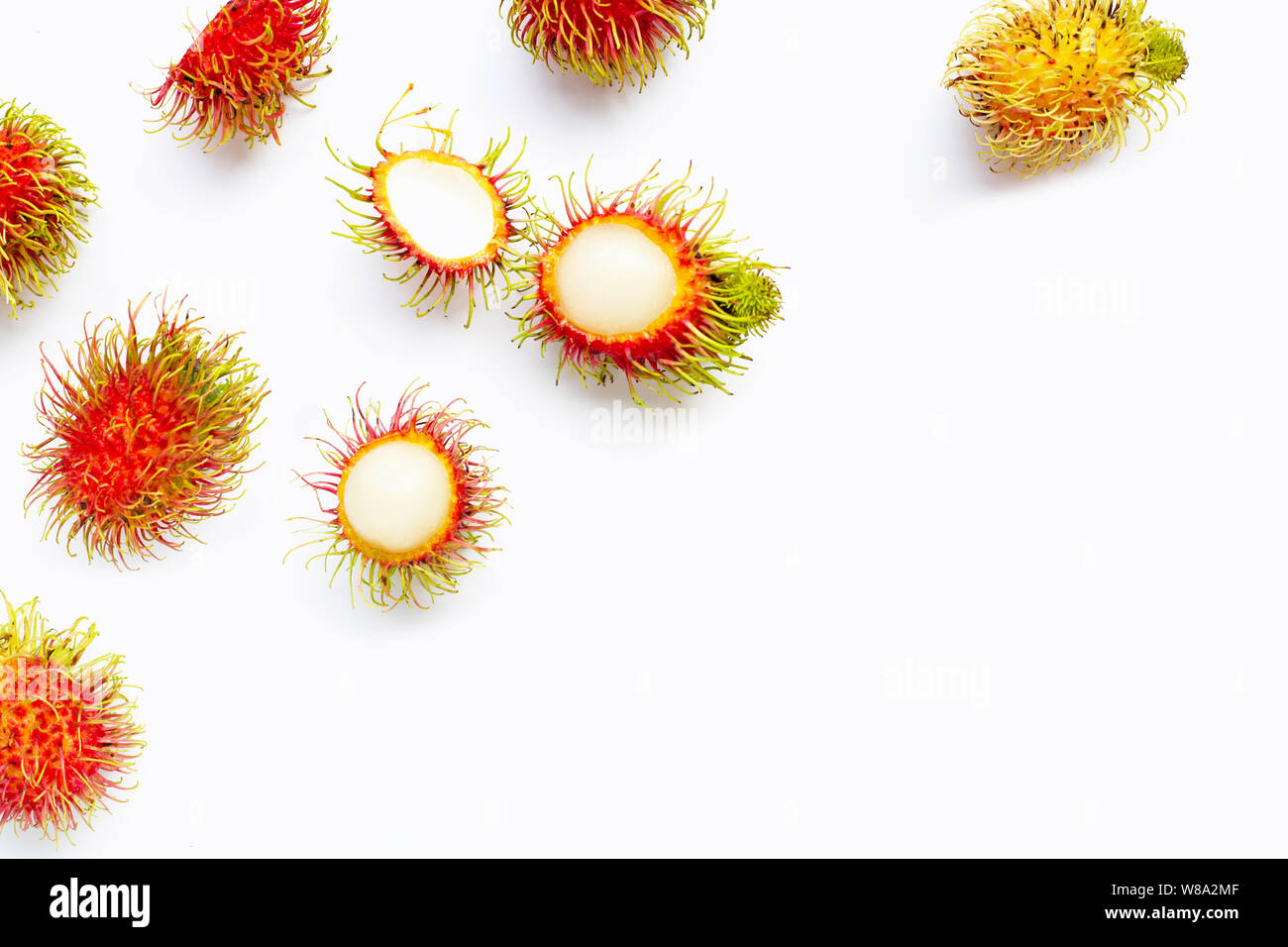 Rambutan isolated on white background. Top view Stock Photo - Alamy